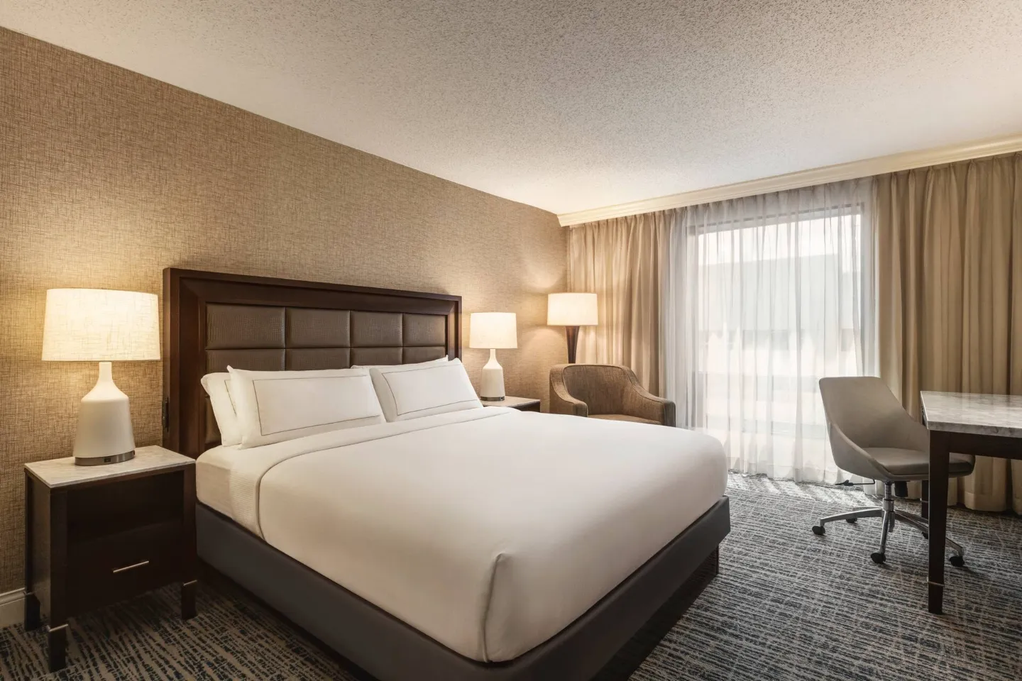 Bright guest room with a king bed